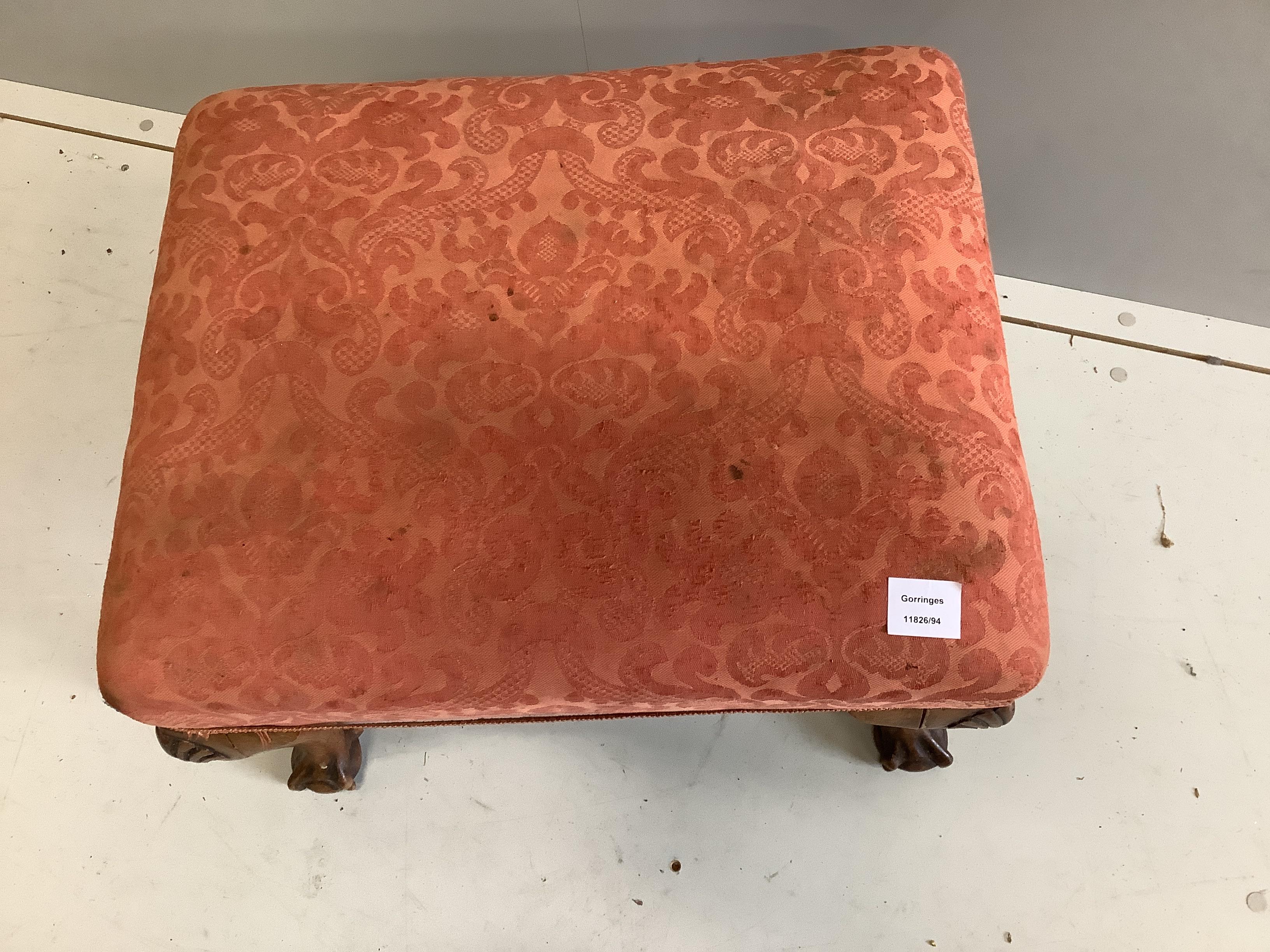 A Queen Anne revival carved walnut dressing stool, width 59cm, depth 47cm, height 40cm